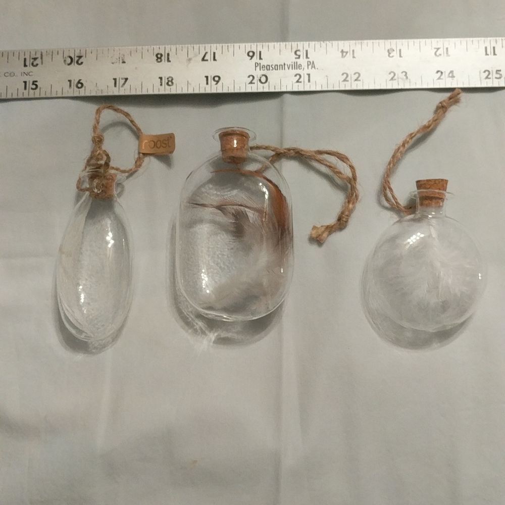Set of three roost ornaments.